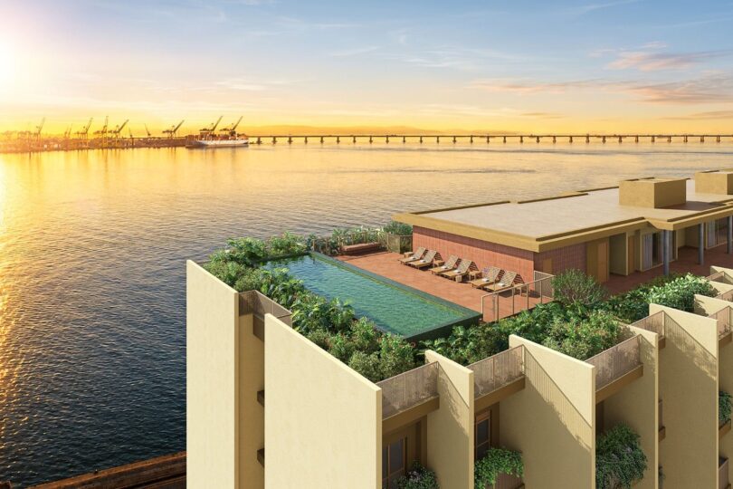 Piscina no rooftop do Erê Residencial com vista para a Baía de Guanabara e a Ponte Rio-Niterói
