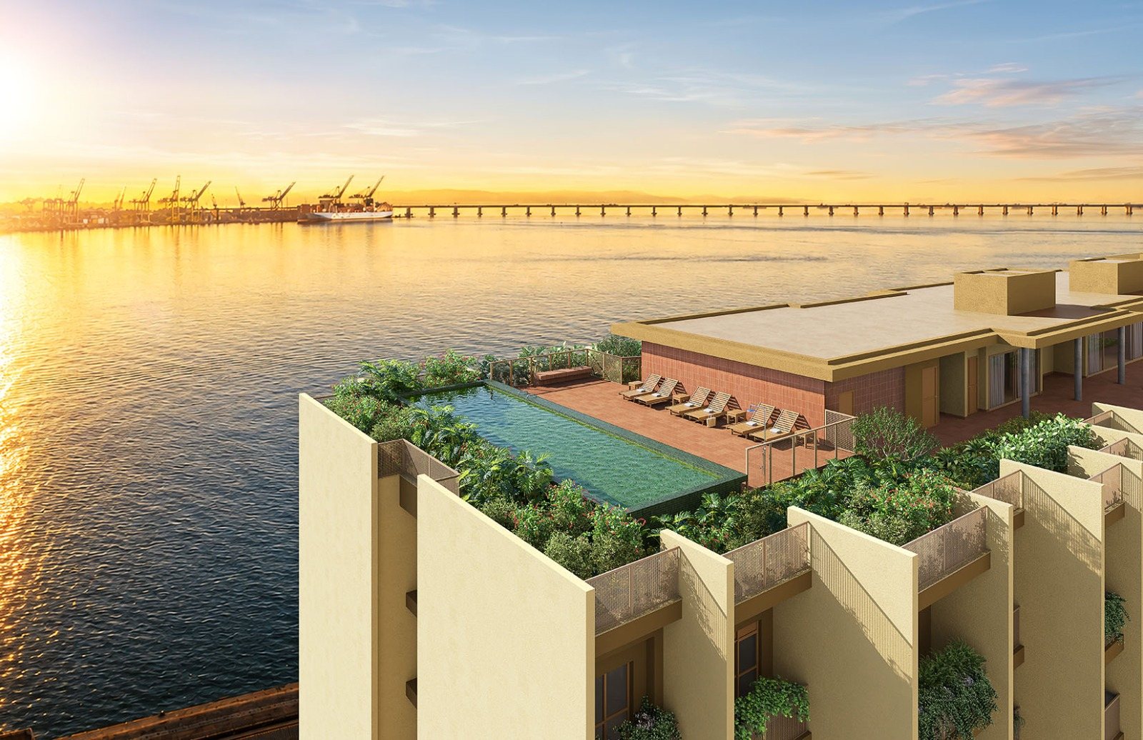 Piscina no rooftop do Erê Residencial com vista para a Baía de Guanabara e a Ponte Rio-Niterói